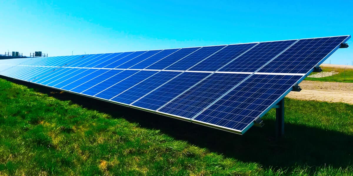 solar panels on a grass field