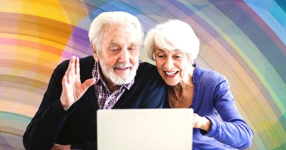 Elderly couple using laptop