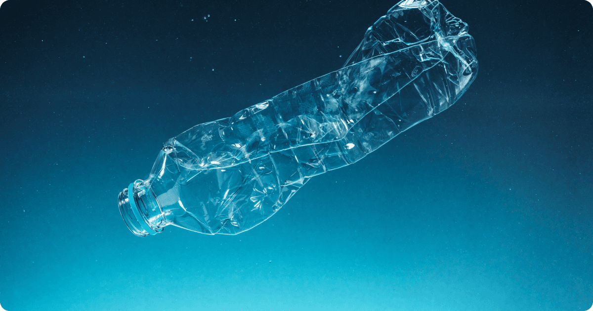 Single use bottle floating in the ocean