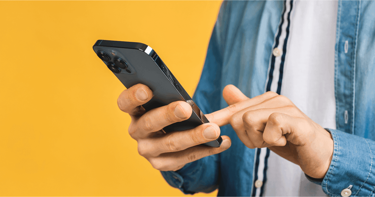 Man scrolling on mobile phone