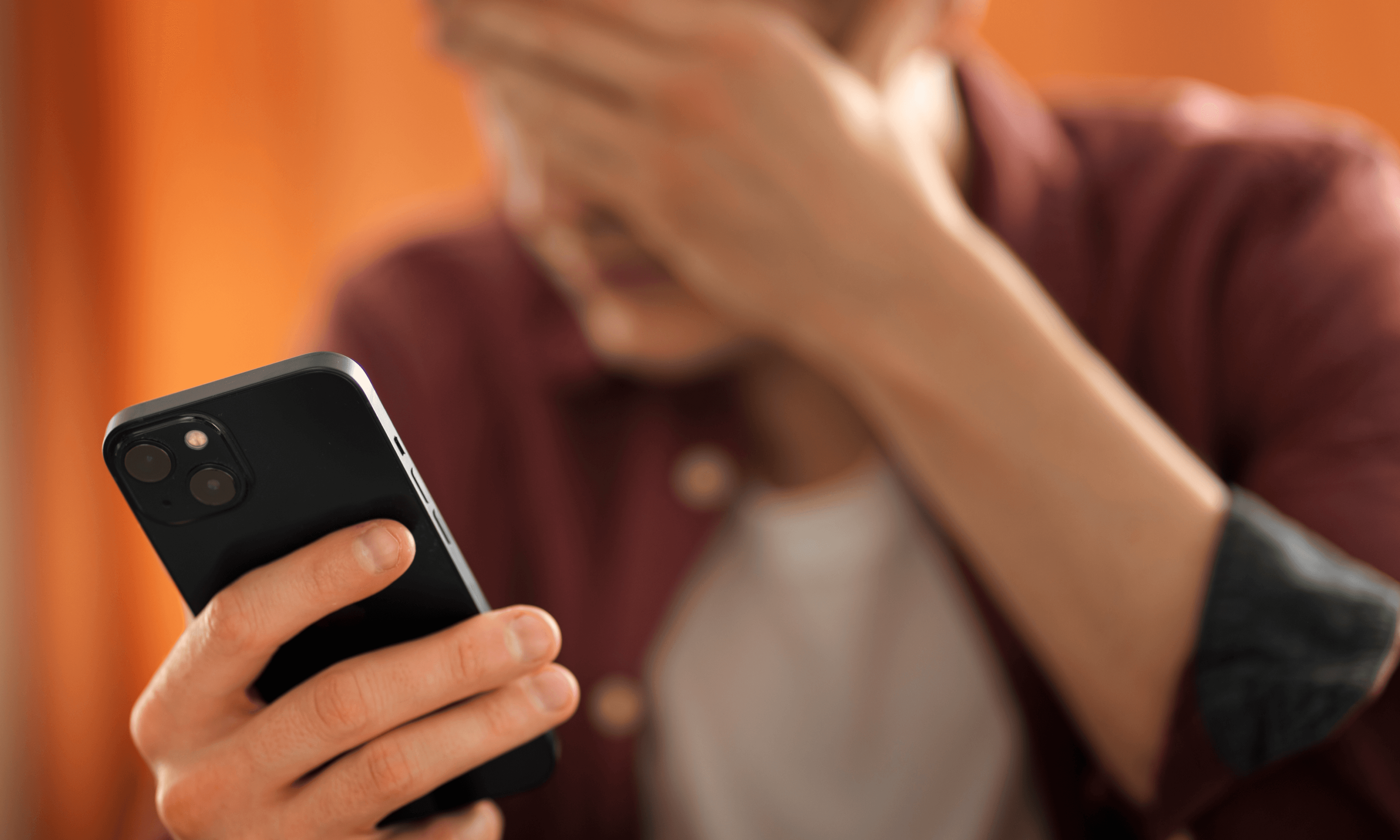 man panicking about iphone depreciation